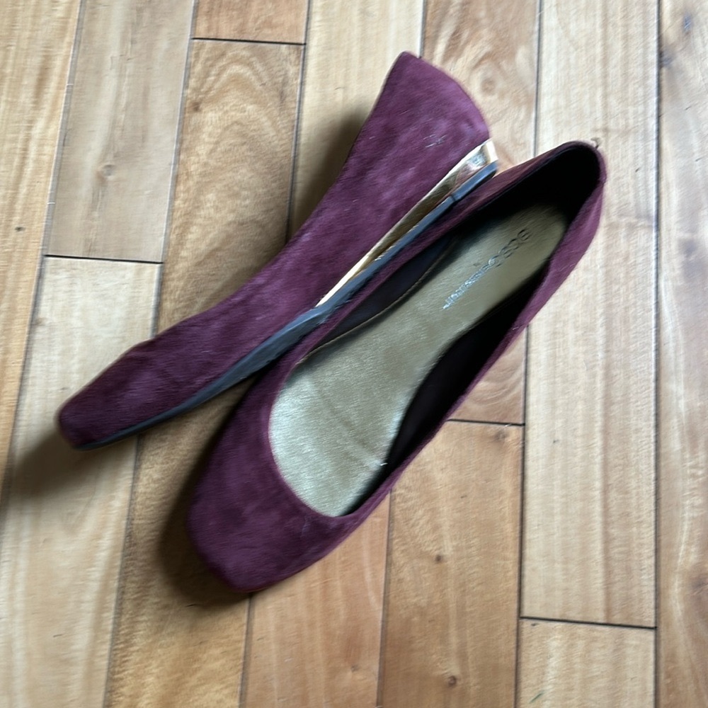 BCBG Generation burgundy suede flats with a gold stripe.  Size 8.5.